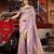 Purple ethnic motifs woven design saree