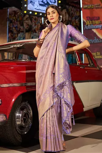 Purple ethnic motifs woven design saree