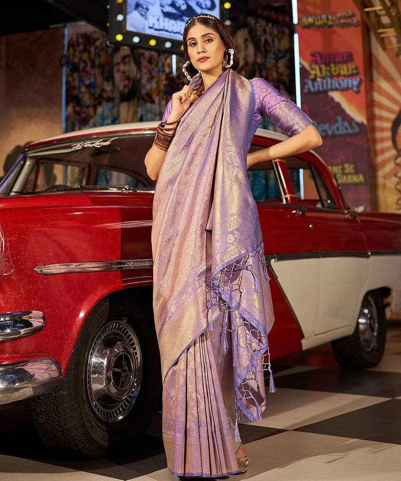Purple ethnic motifs woven design saree
