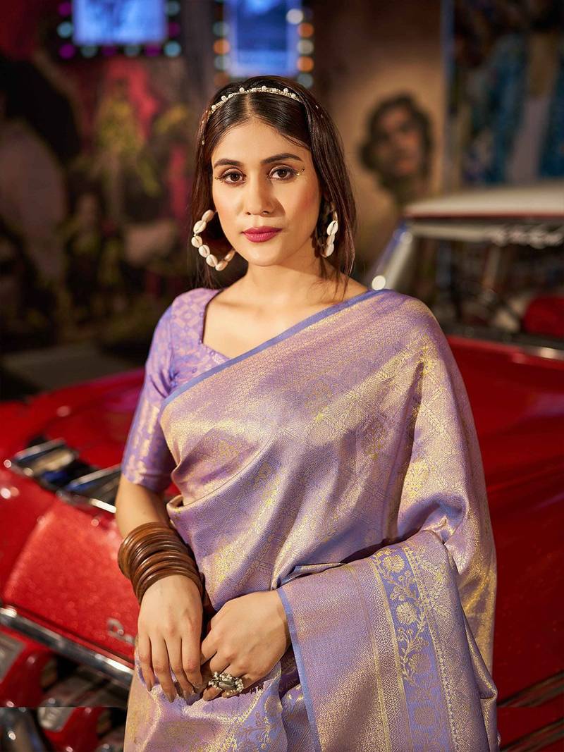 Purple ethnic motifs woven design saree