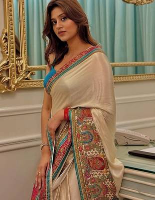 Cream ethnic motifs satin saree 1