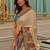 Cream ethnic motifs satin saree