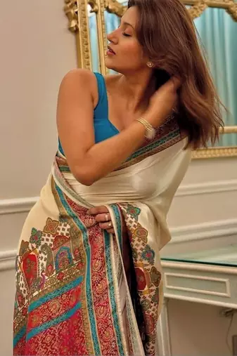 Cream ethnic motifs satin saree