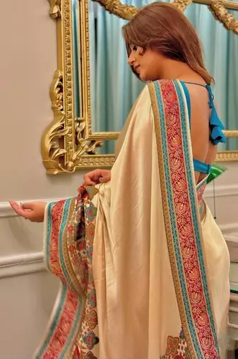 Cream ethnic motifs satin saree