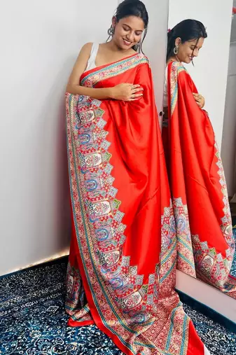 Red ethnic motifs satin saree
