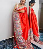 Red ethnic motifs satin saree