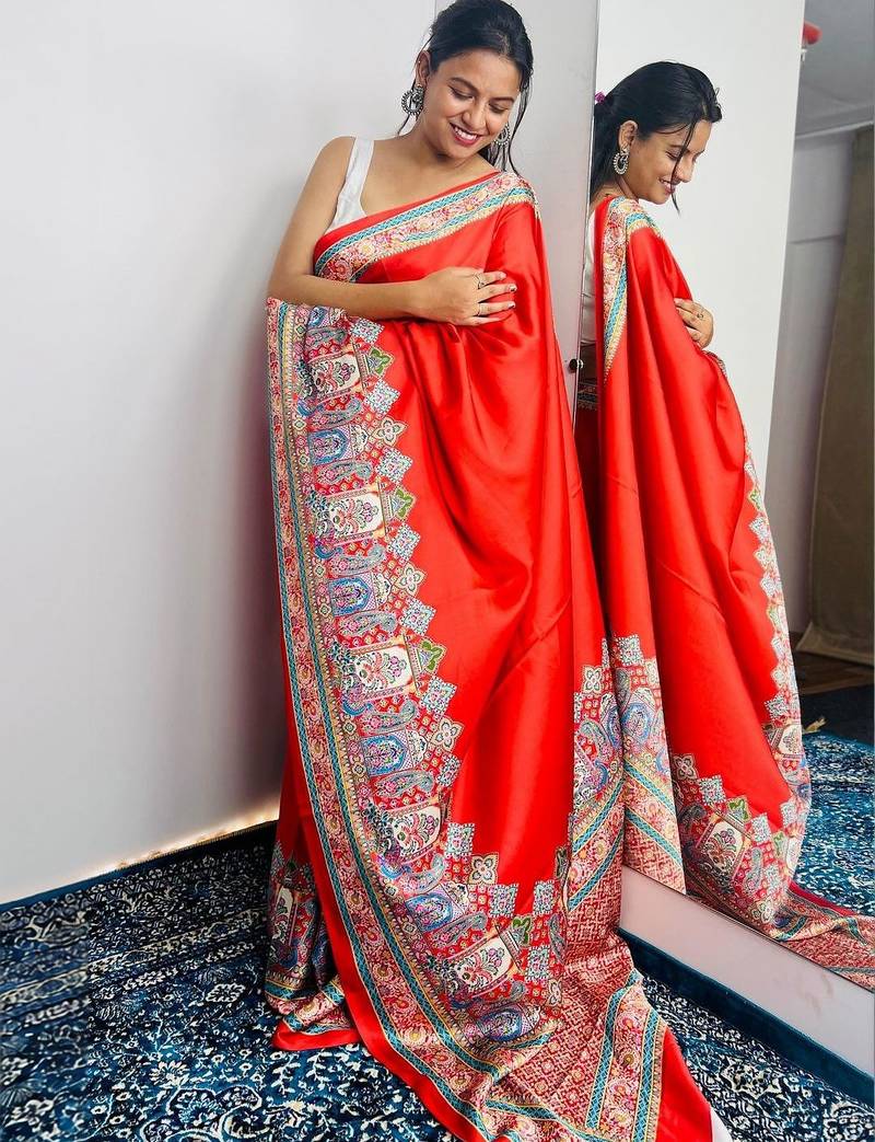 Red ethnic motifs satin saree