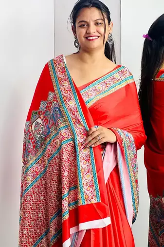 Red ethnic motifs satin saree