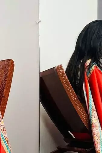 Red ethnic motifs satin saree