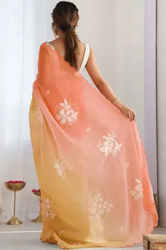 Yellow floral embroidered saree with unstitched blouse piece