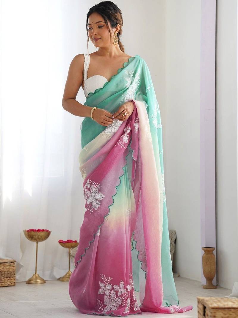 White floral embroidered saree with unstitched blouse piece