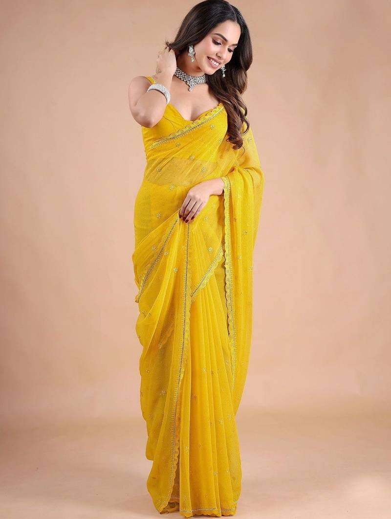 Yellow embellished zari pure chiffon heavy work saree
