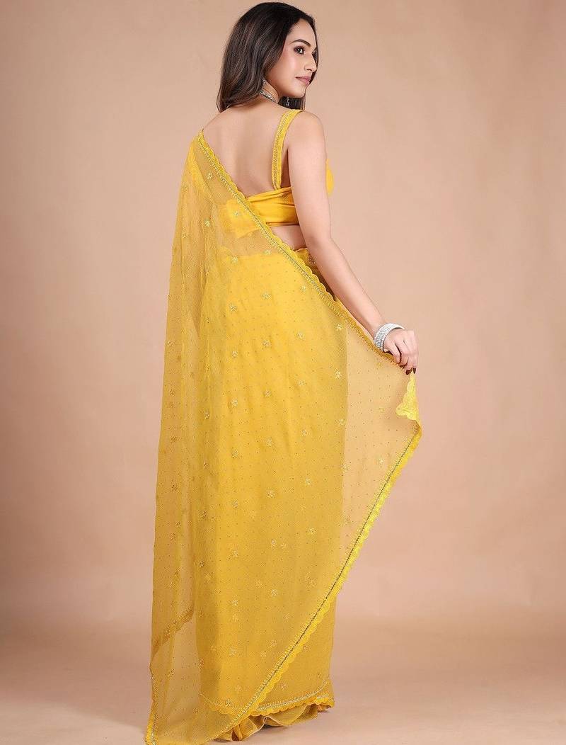 Yellow embellished zari pure chiffon heavy work saree
