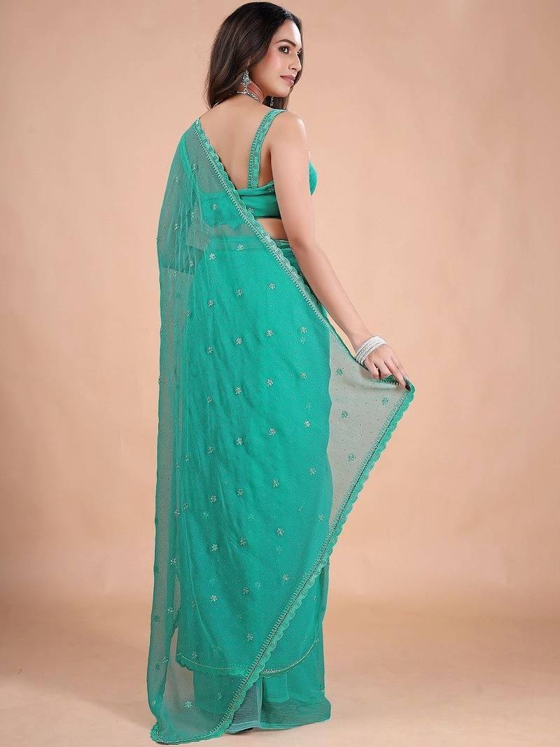 Sea green embellished sequinned pure chiffon heavy work saree
