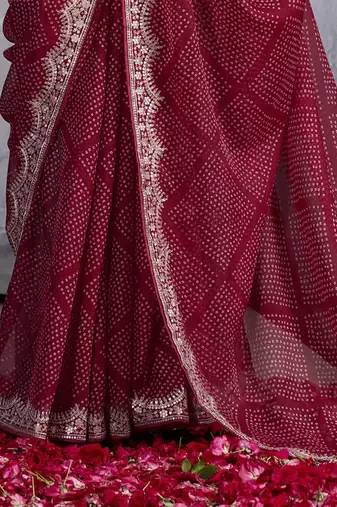 Maroon bandhani sequinned poly chiffon saree