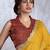 Mustard bandhani sequinned poly chiffon saree