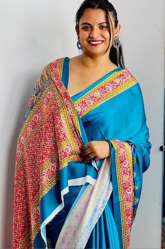 Teal ethnic motifs satin saree