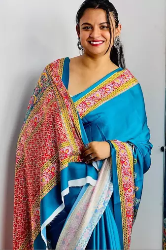 Teal ethnic motifs satin saree
