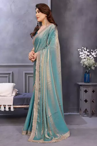 Blue embroidered border satin saree with matching blouse piece