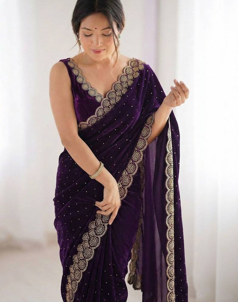 Purple embellished sequinned silk blend heavy work saree