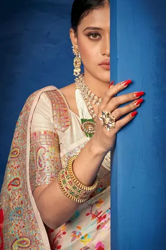 Cream ethnic motifs woven design zari kanjeevaram saree