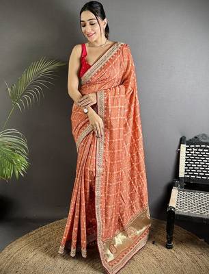 Orange woven design zari silk blend heavy work bandhani saree 1