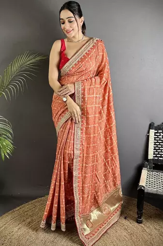 Orange woven design zari silk blend heavy work bandhani saree