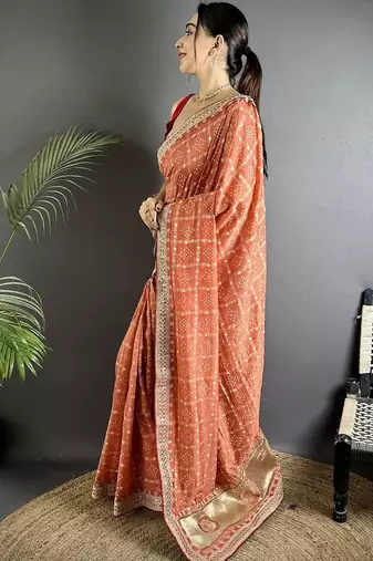 Orange woven design zari silk blend heavy work bandhani saree