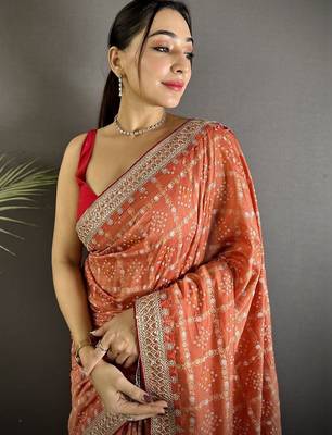 Orange woven design zari silk blend heavy work bandhani saree 4