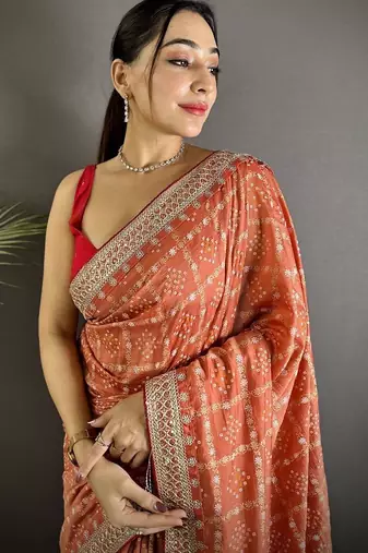 Orange woven design zari silk blend heavy work bandhani saree
