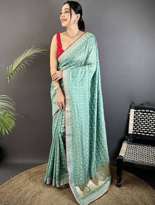 Teal ethnic motifs sequinned silk blend bandhani saree 1