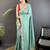 Teal ethnic motifs sequinned silk blend bandhani saree