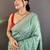 Teal ethnic motifs sequinned silk blend bandhani saree