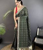 Green sequinned silk blend handloom bandhani saree