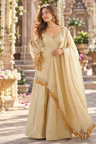 Beige silk blend readymade suit with mirror & border work
