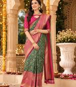 green jacquard saree with silver zari weaving     elegant party wear ethnic saree