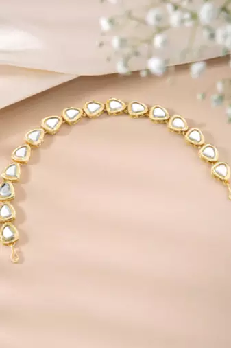 Gold-plated stone studded sheeshphool head jewellery