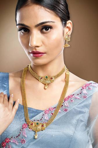 Women's gold toned synthetic stone & pearl studded peacock necklace set