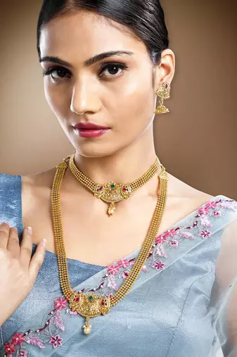 Women's gold toned synthetic stone & pearl studded peacock necklace set