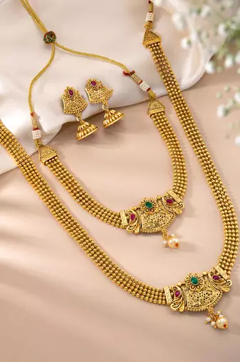 Women's gold toned synthetic stone & pearl studded peacock necklace set