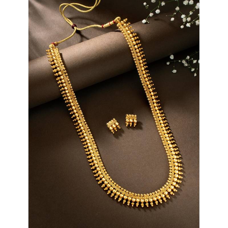 Women's gold toned long maharani haar necklace with earrings south style