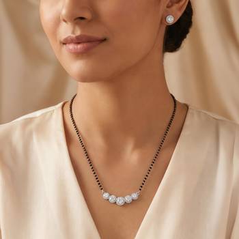 Women's brass silver toned five round mangalsutra & stud earring set 1