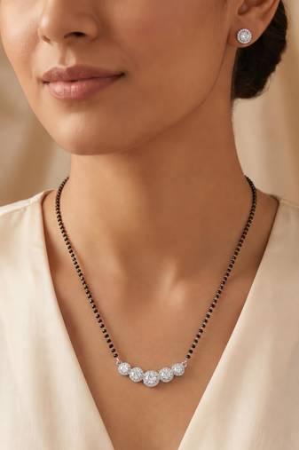 Women's brass silver toned five round mangalsutra & stud earring set