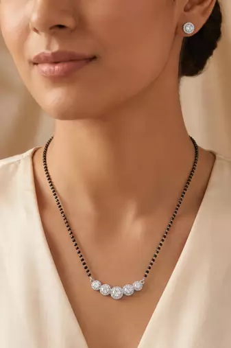 Women's brass silver toned five round mangalsutra & stud earring set
