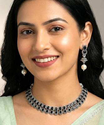 Black oxidised necklace earrings set crystals studded festive design 1