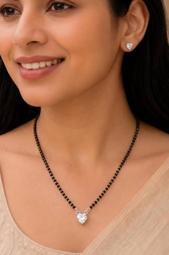 Women's silver toned heart solitaire mangalsutra & stud earring set