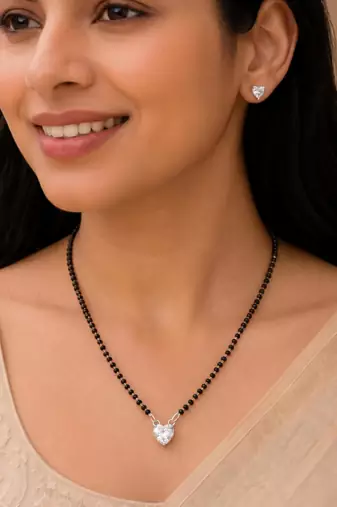 Women's silver toned heart solitaire mangalsutra & stud earring set