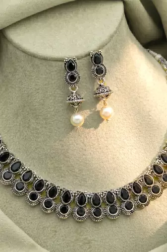 Black oxidised necklace earrings set crystals studded festive design