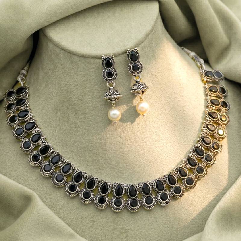 Black oxidised necklace earrings set crystals studded festive design