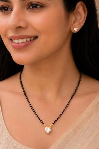 Women's golden toned heart solitaire mangalsutra & stud earring set